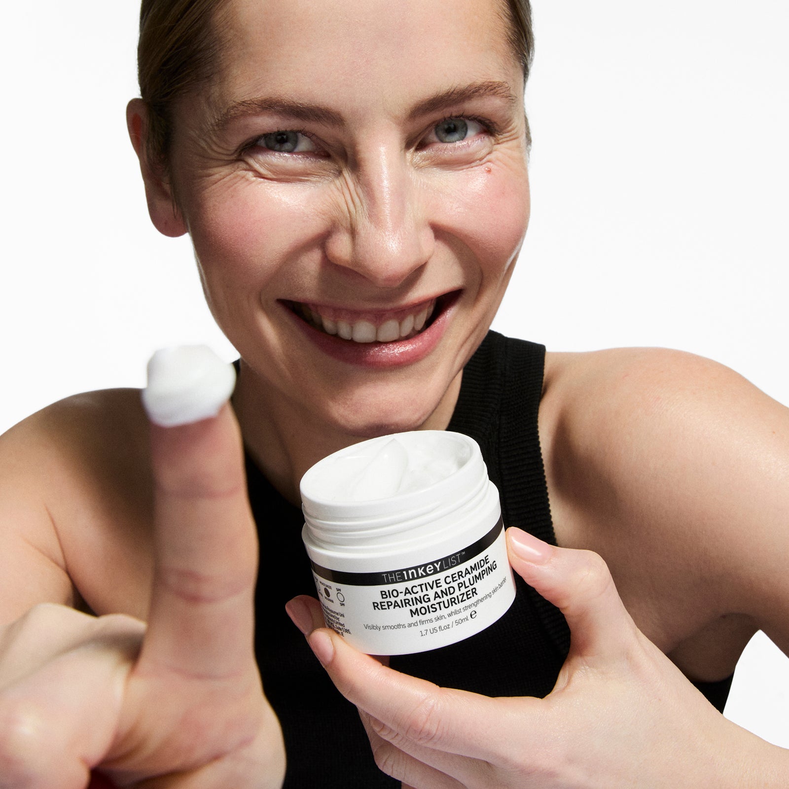 Model with BioActive Moisturiser on her finger