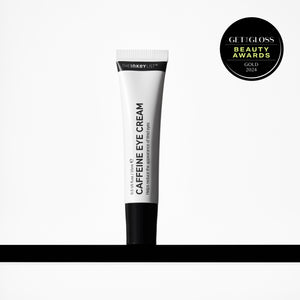 Caffeine Eye Cream on a shelf with award badge