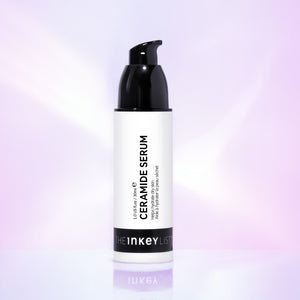 Ceramide Serum bottle on purple background