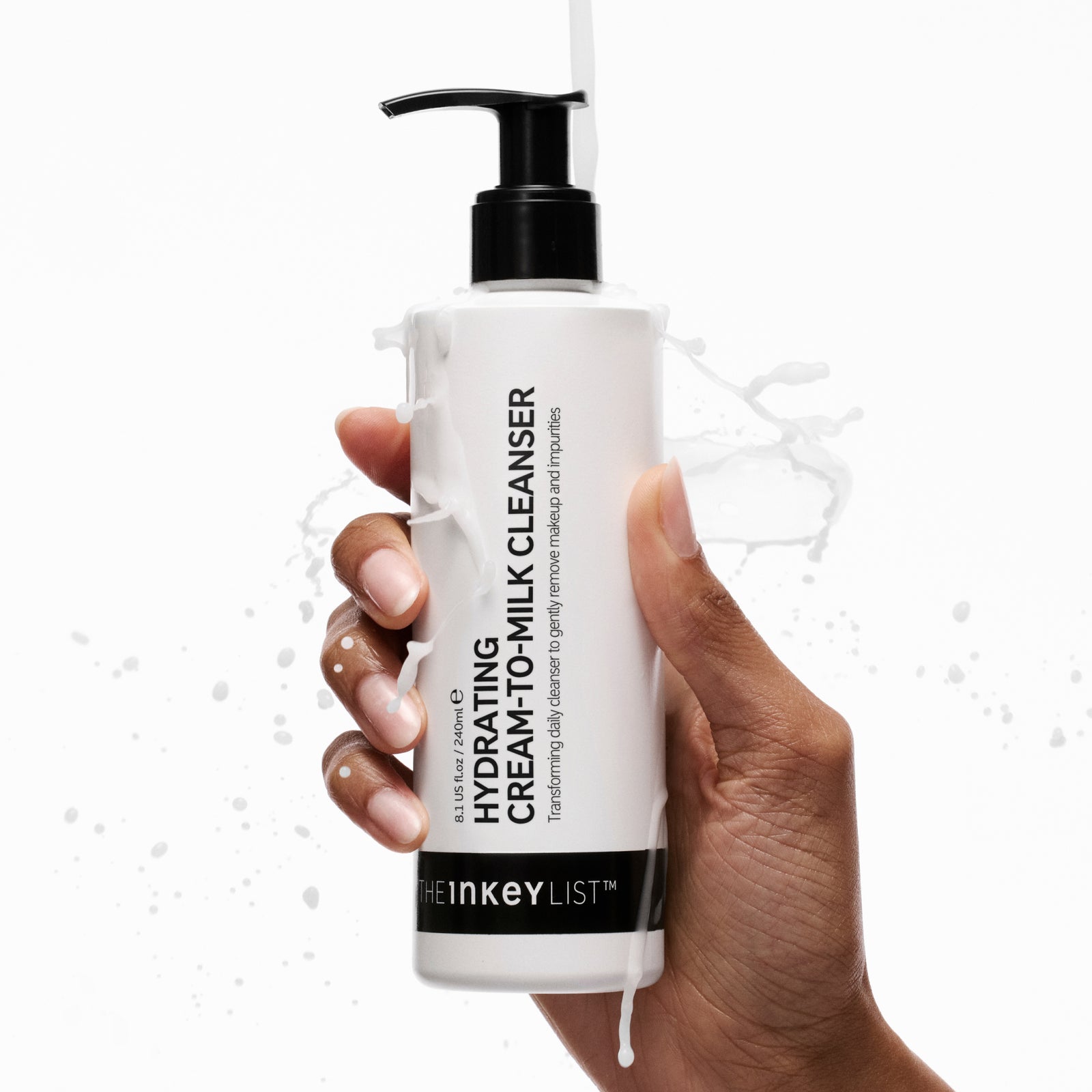 Model holding Hydrating Cream-to-Milk Cleanser