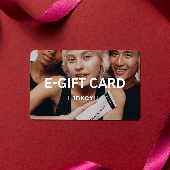 e-Gift Card with 3 people on it, sitting on top of red background