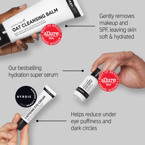 Award hand shot including Oat Cleansing Balm with Allure Best of Beauty 2023 award badge, HA Serum Allure Best of Beauty 2022 award and Caffeine Eye Byrdie 2022 award