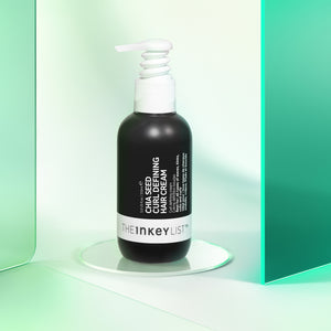 Chia seed curl defining hair treatment pack shot on green background