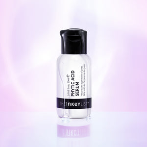 Phytic Acid Serum bottle against purple background with serum coming down the outside