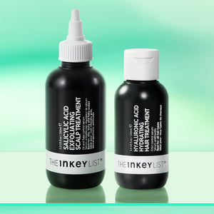 The Ultimate Scalp & Hair Duo products on green background