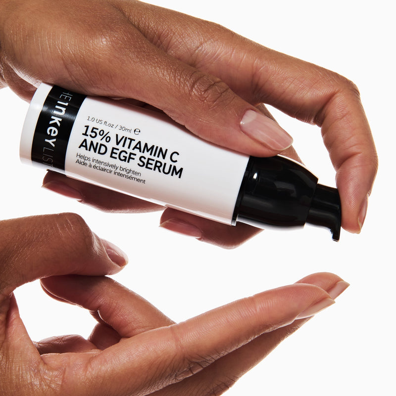 15% vitamin c bottle and hand