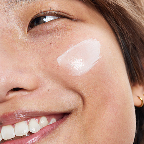 Women with cream on her face
