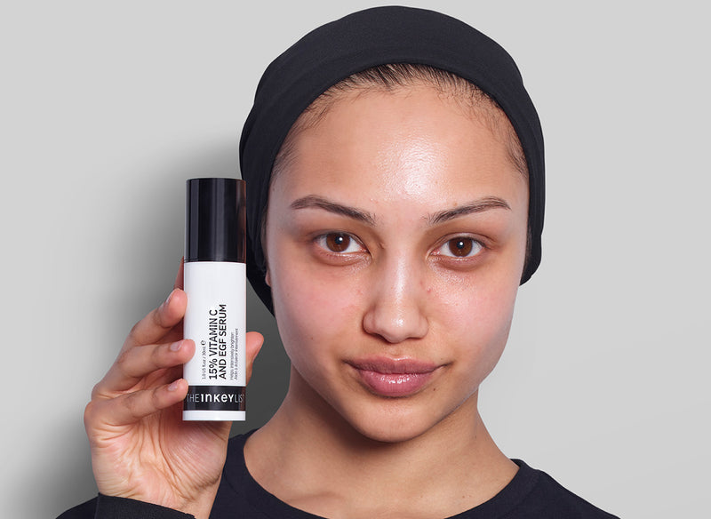 Model with Vitamin C bottle