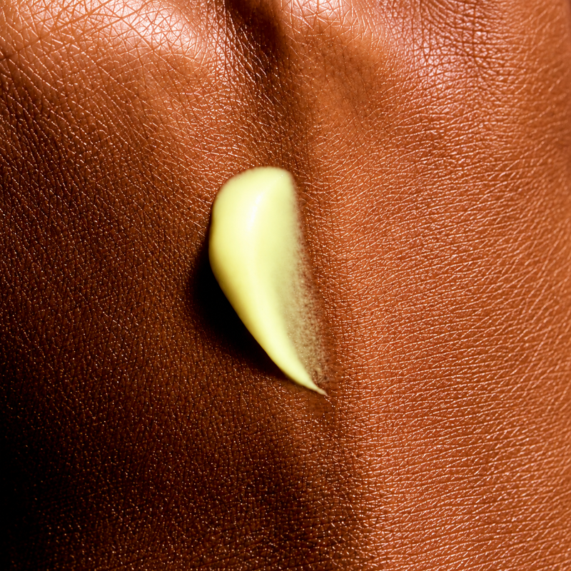 close up of retinol on back of hand