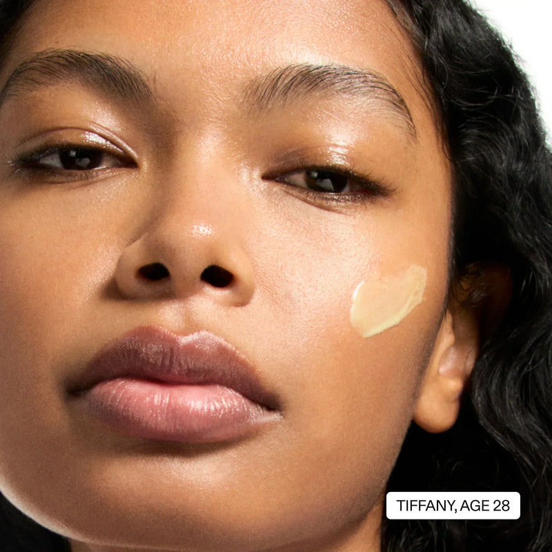 woman with retinol on her face