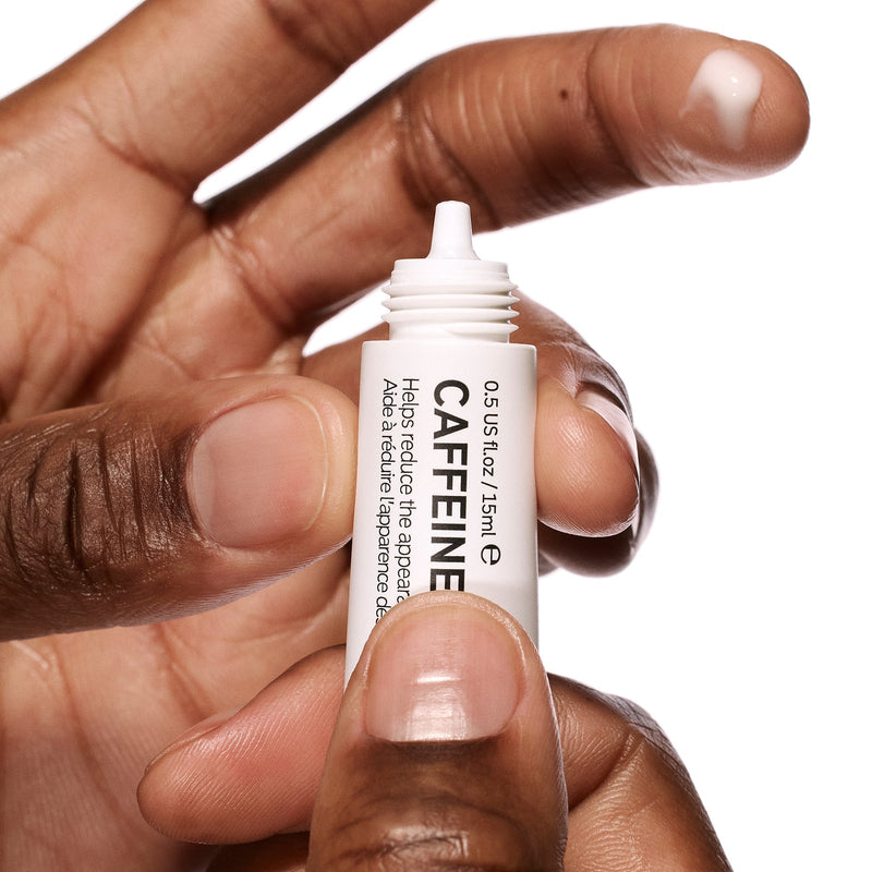 eye cream on fingers