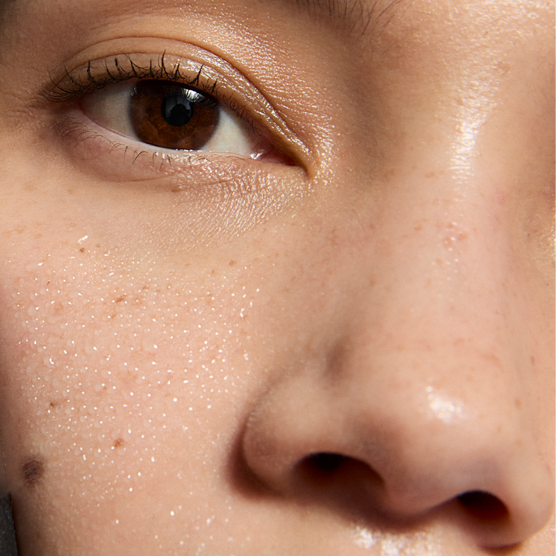 Woman with droplets on her face