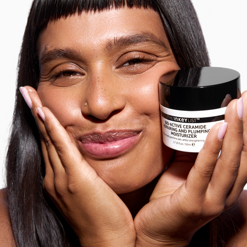 woman holding bio active moisturiser
