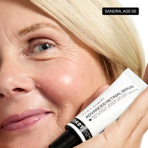 Woman holding a skincare product with 'Sandra, Age 66' text