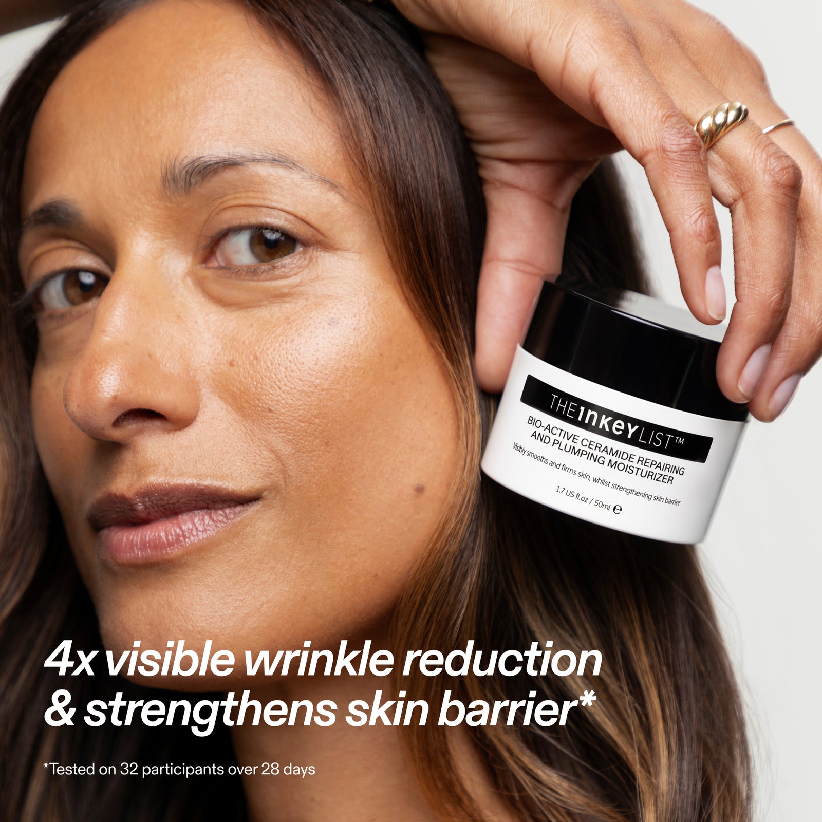 Woman holding a jar of The Inkey List skincare product with text about wrinkle reduction.