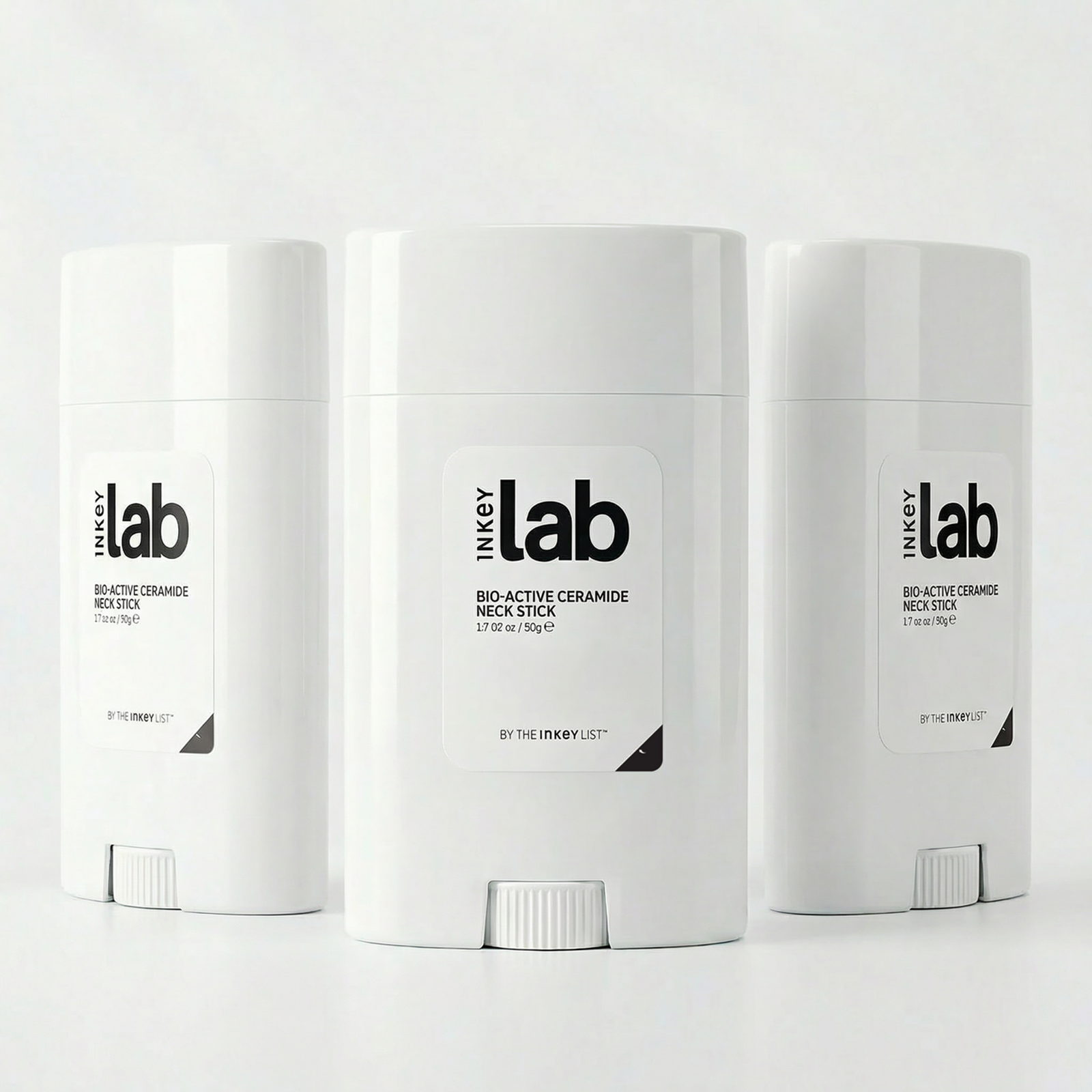 Three INKEY Lab neck sticks on a white background