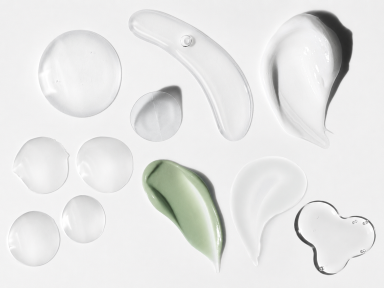 Collection of INKEY serums on a white background