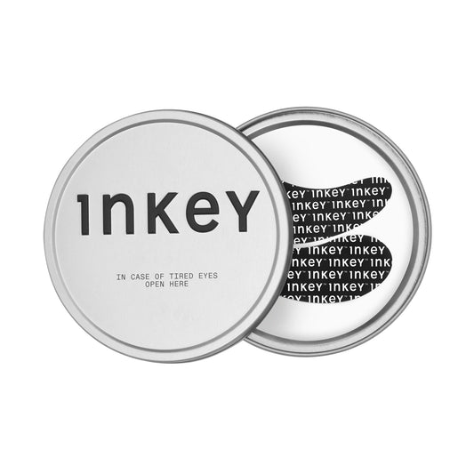 Two silver tins with 'Inkey' branding on a white background