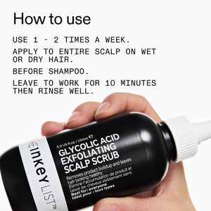 Hand holding a bottle of Heinkey List Glycolic Acid Exfoliating Scalp Scrub with usage instructions.