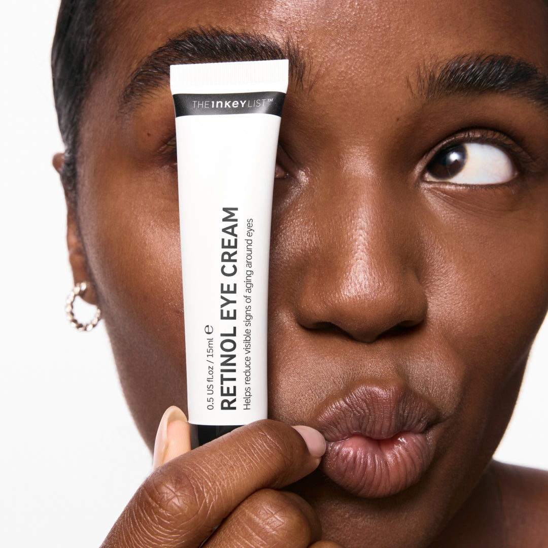 Model holding tube of Retinol Eye Cream