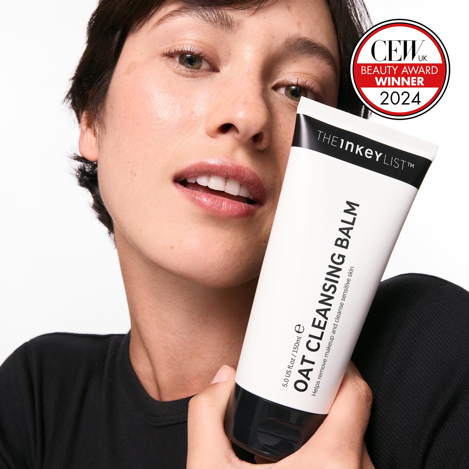 Model with Oat Cleansing Balm and Allure award