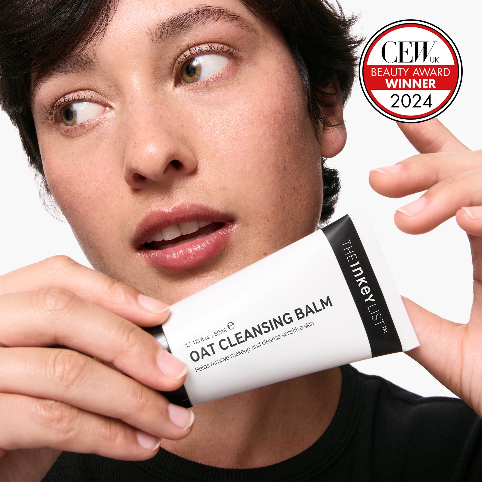Model with oat balm 50ml and allure 2024 winner award badge 