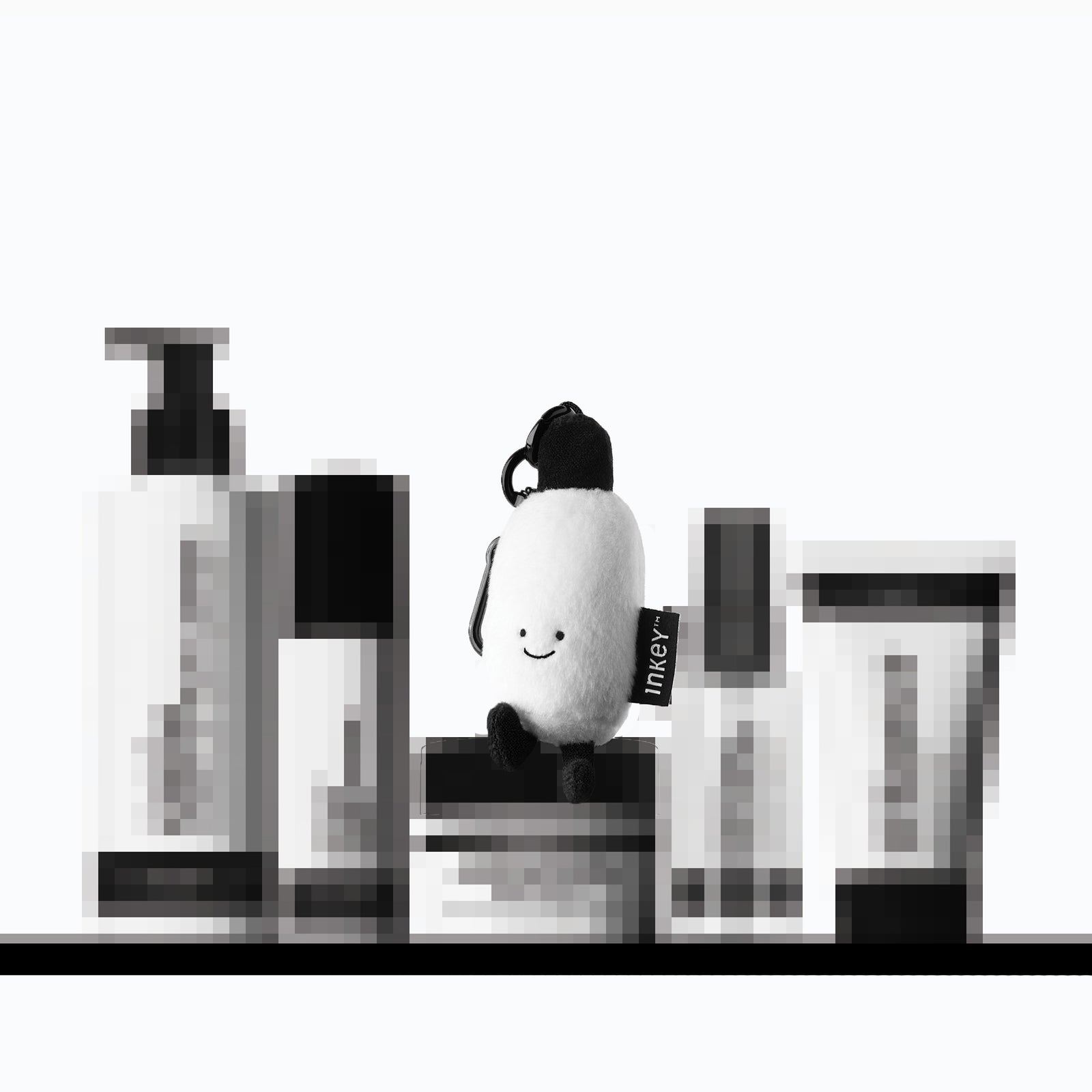 Secret products on a shelf with the free plushie sat on top
