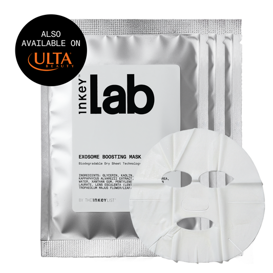 Inkey Lab Exosome Boosting Mask shown with its metallic silver pouch and a single white biodegradable sheet mask in front, on a plain white background. A black circular badge in the top-left says 'ALSO AVAILABLE ON ULTA BEYOND'.