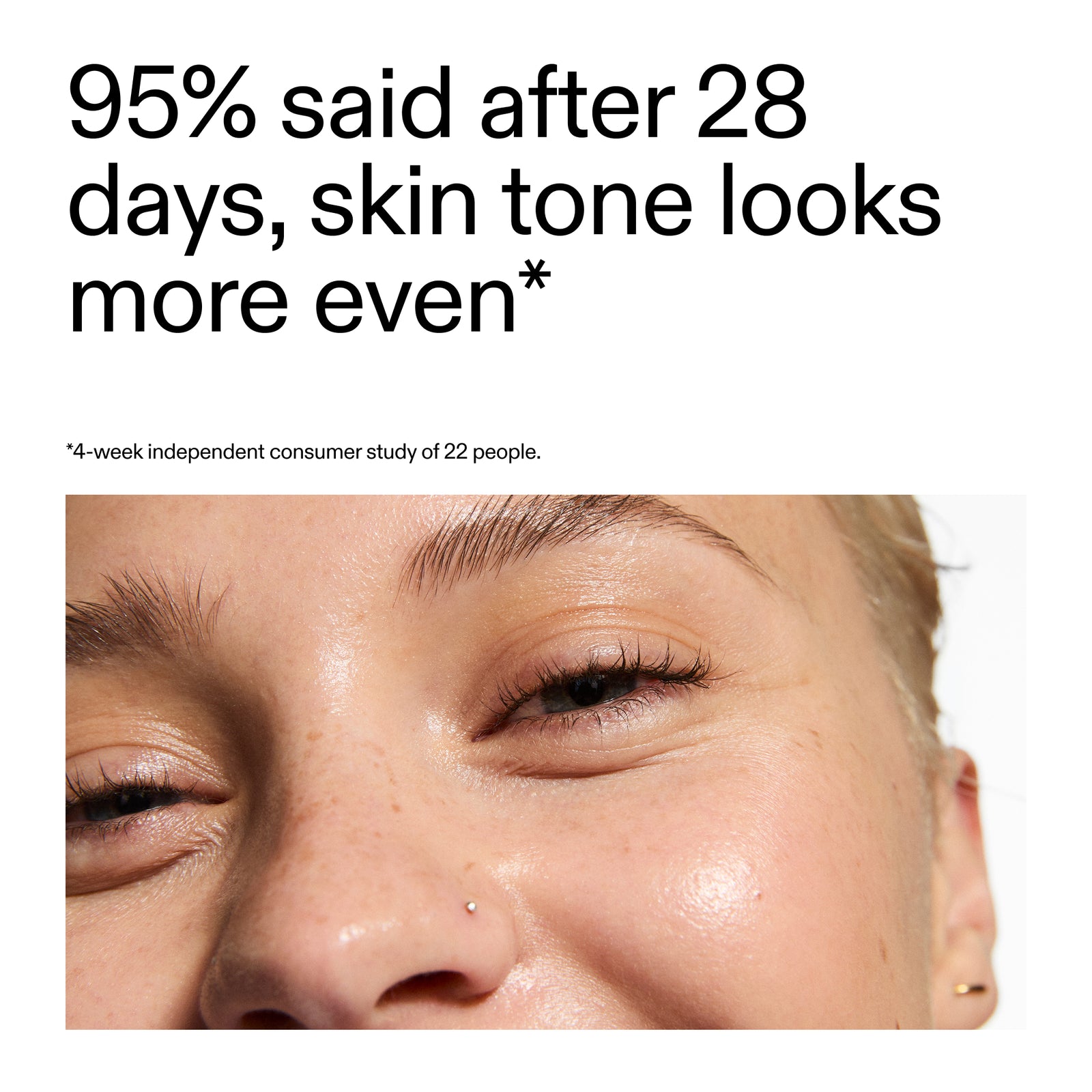 Advertisement showing a close-up of a person's face with text about skin tone improvement after 28 days.