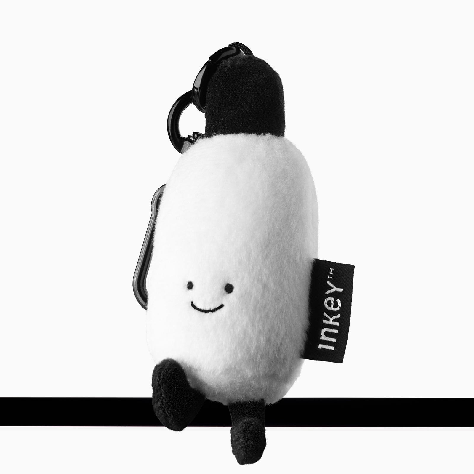 Limited edition Hyaluronic Acid Serum plushie sat on a shelf