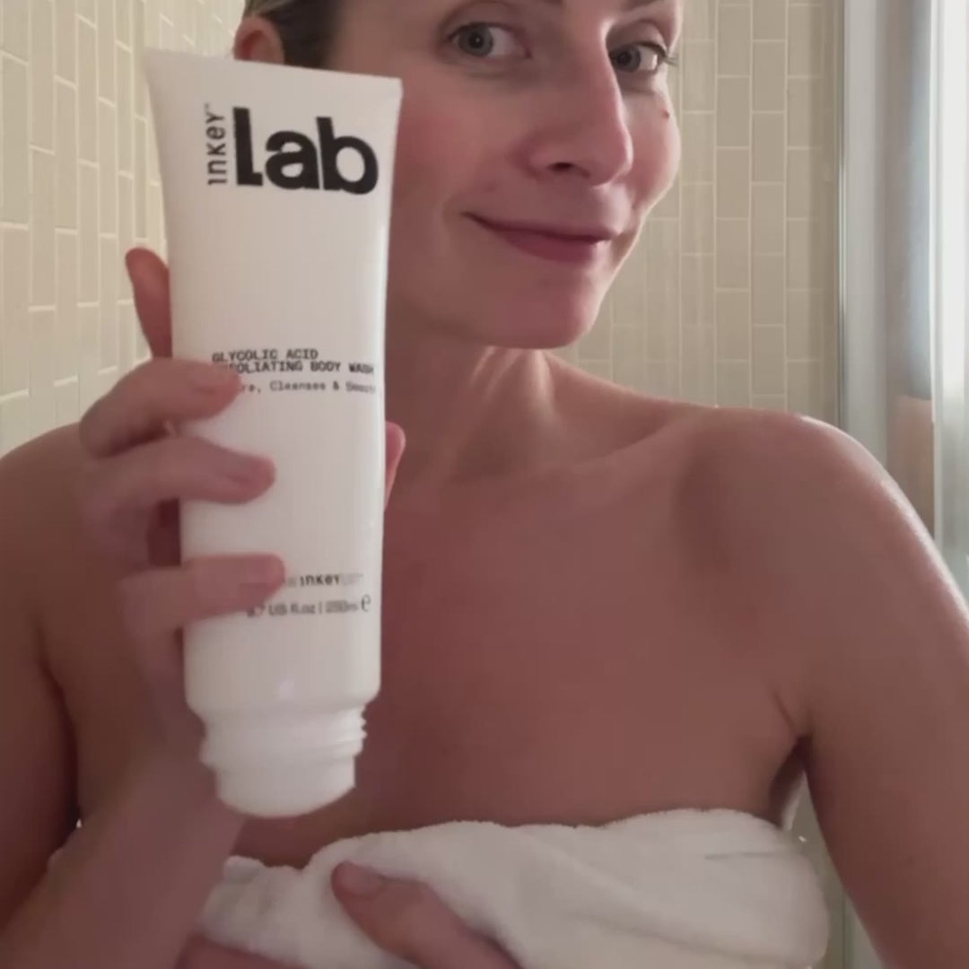 woman applying body wash