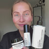 woman applying her skincare routine