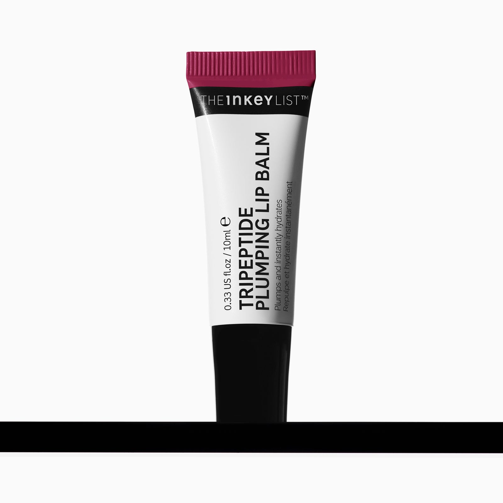 Tube of The Inkey List Tripeptide Plumping Lip Balm in berry  on a white background
