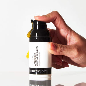 Apple Cider Vinegar Acid Peel bottle pump being pushed